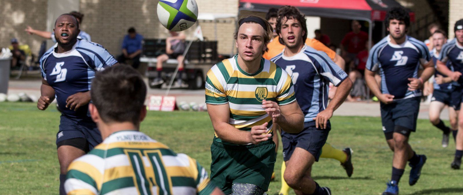 69's rugby team competes against the University of San Diego in a local tournament.